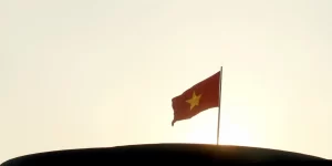 (FILE PHOTO) A Vietnamese national flag is seen on the rooftop of the National Assembly's Ba Dinh hall in Hanoi. (REUTERS/Kham/File Photo)
