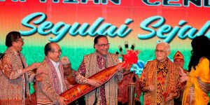 KUCHING, June 7 -- Prime Minister Datuk Seri Anwar Ibrahim (centre) tries the traditional Sarawak musical instrument ‘sape’ at the 2023 Gawai Dayak Festival at the Borneo Convention Center Kuching last week. BERNAMAPIX